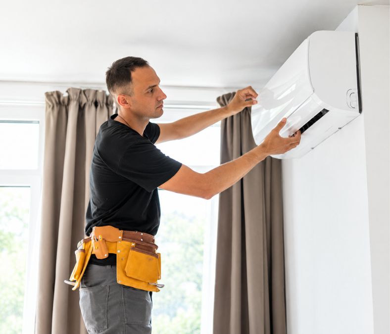 HVAC technician diagnosing a heating and cooling system