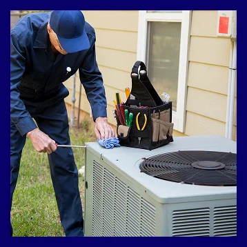 HVAC technician inspecting an air conditioner during professional AC repair in Smyrna, TN